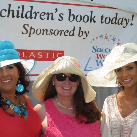 Margherita Carrieri-Russo and Success Won't Wait co-founders Susan Conforte McNeill and Vincenza Carrieri-Russo man the book giveaway tent at 2015 Point-to-Point.