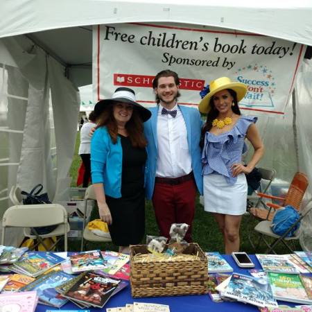 Manning the book giveaway are Success Won't Wait co-founders Susan McNeill (L) and Vincenza Carrieri-Russo (R) with long-time volunteer Matthew McNeill.