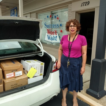 Success Won't Wait supports the Friends of the Wilmington Library with 500+ book donation